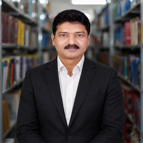 Dr. Milan Das